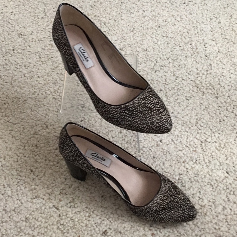 Clarks black & white hair calf pump with 2” patent leather heel.